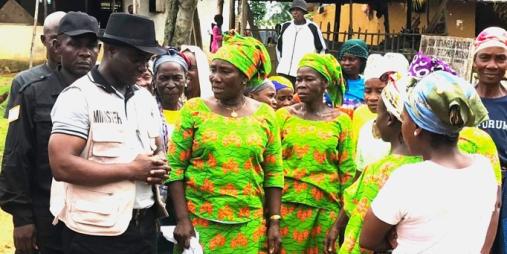 Agriculture Minister Dr. J. Alexander Nuetah in conversation with farmers in Gbarpolu County, Western Liberia