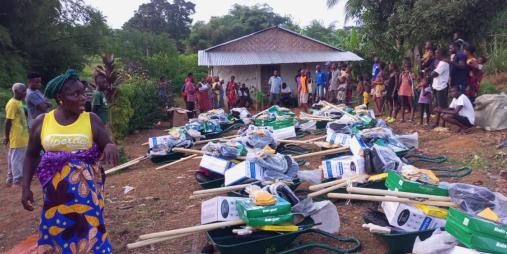 farmers receiving farming implements